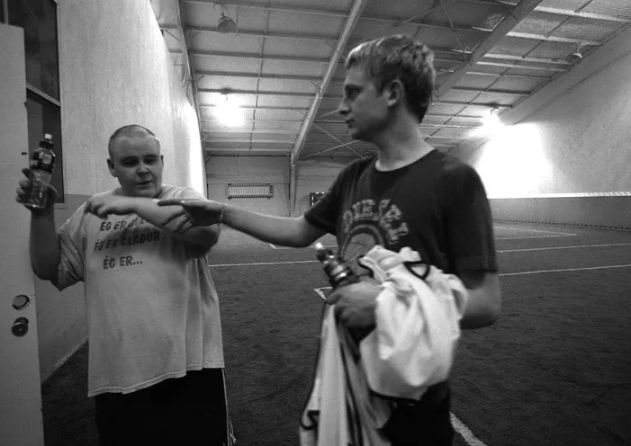 lads play on football pitch