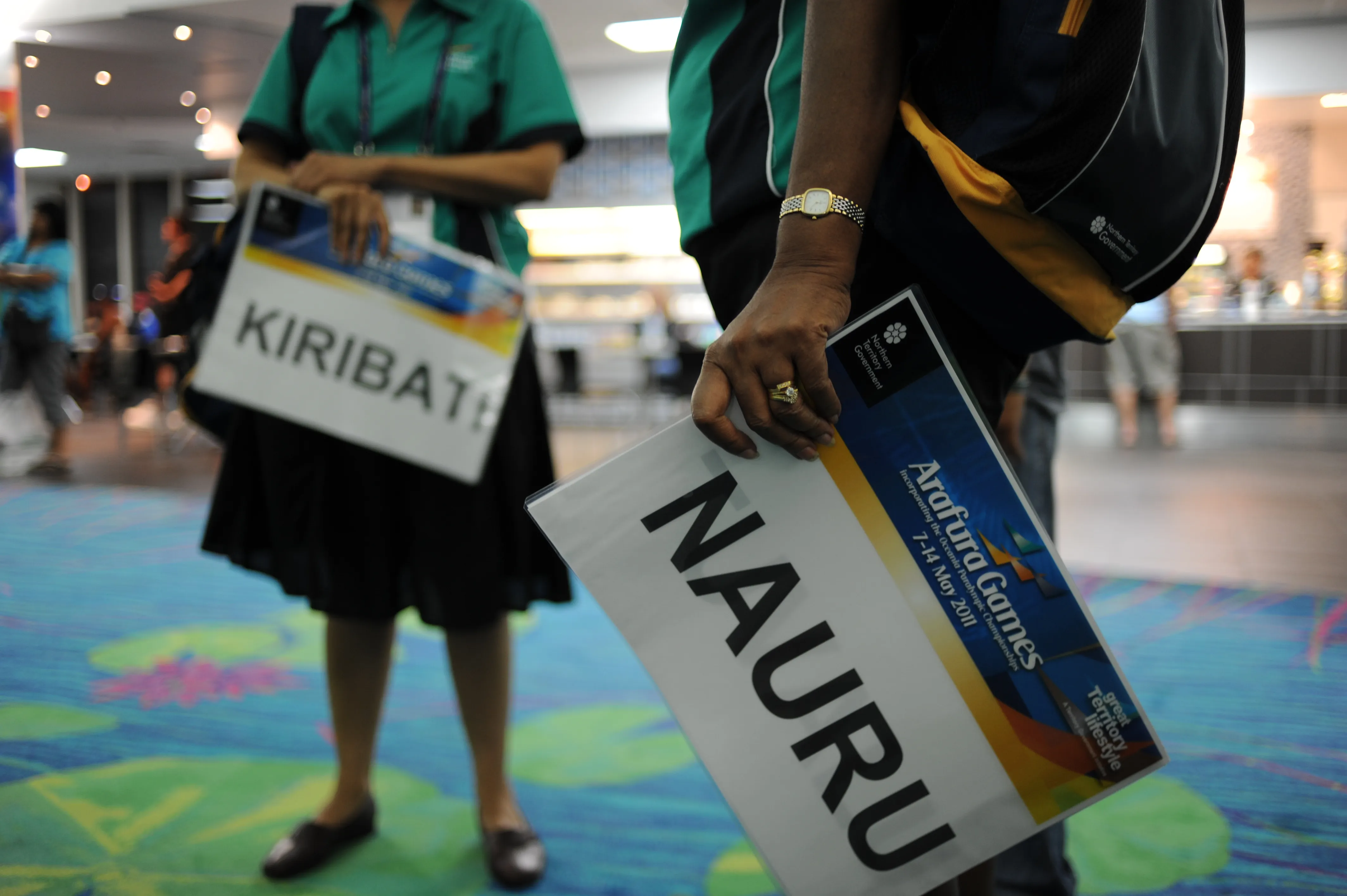 signs waiting for Nauru and Kiribati athlets