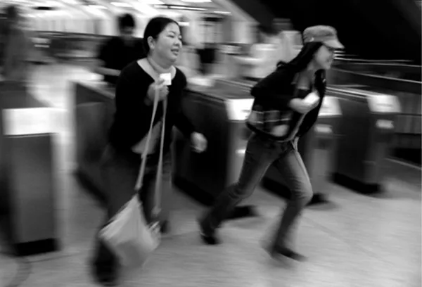 spanning students run to catch a train