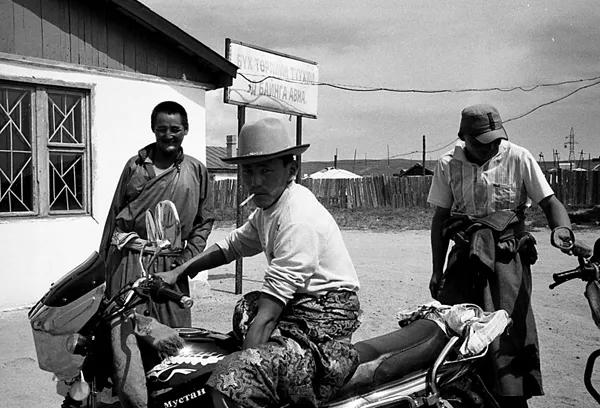 mongolian lads with motorbikes