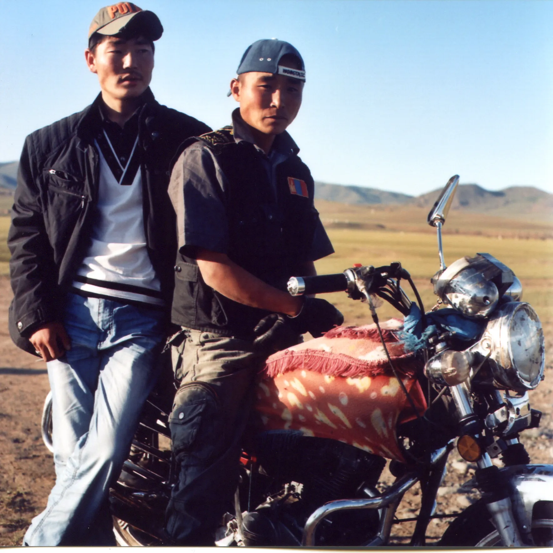 two guys with motorbike medium format