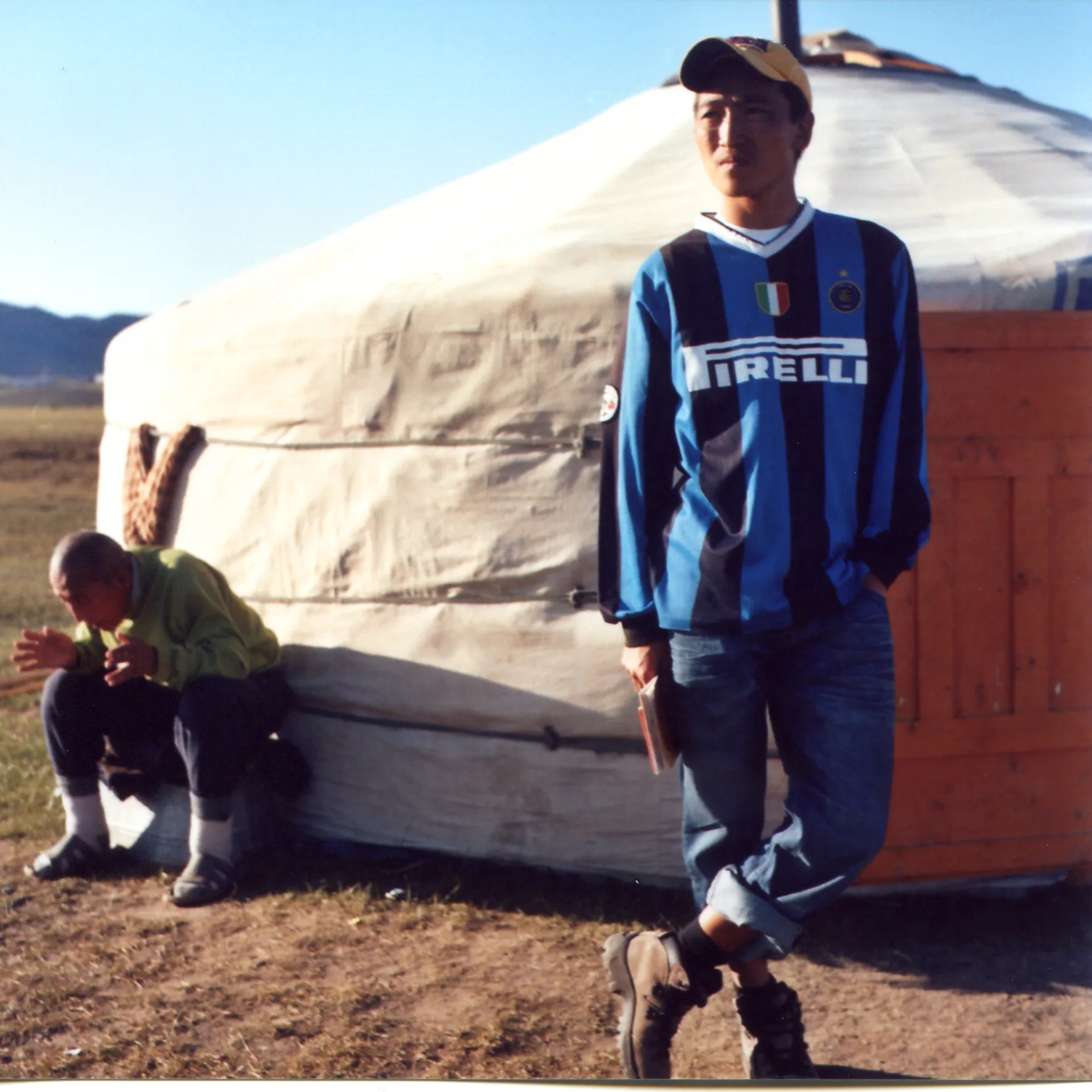 Bolormunk with inter milan jersey next to his family ger mongolian tent