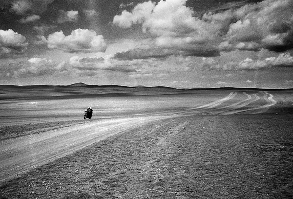 moto on the road Mongolian landscape