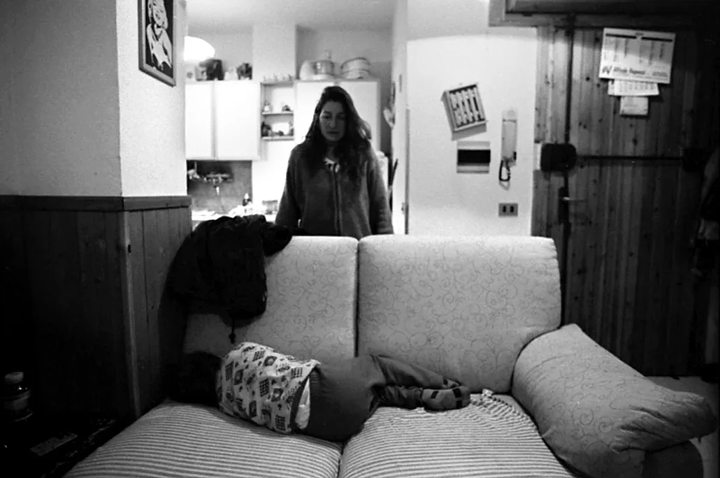 woman with kid on the sofa sleeping