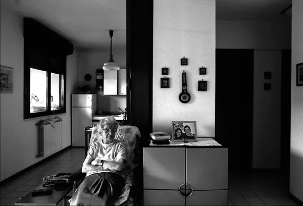 old lady in her flat