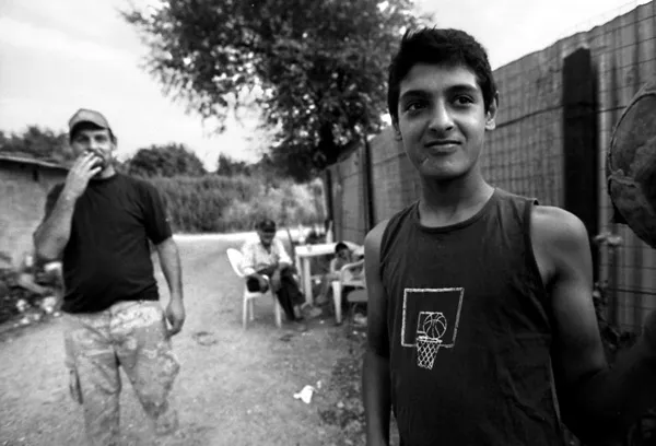 man and lad playing basketball