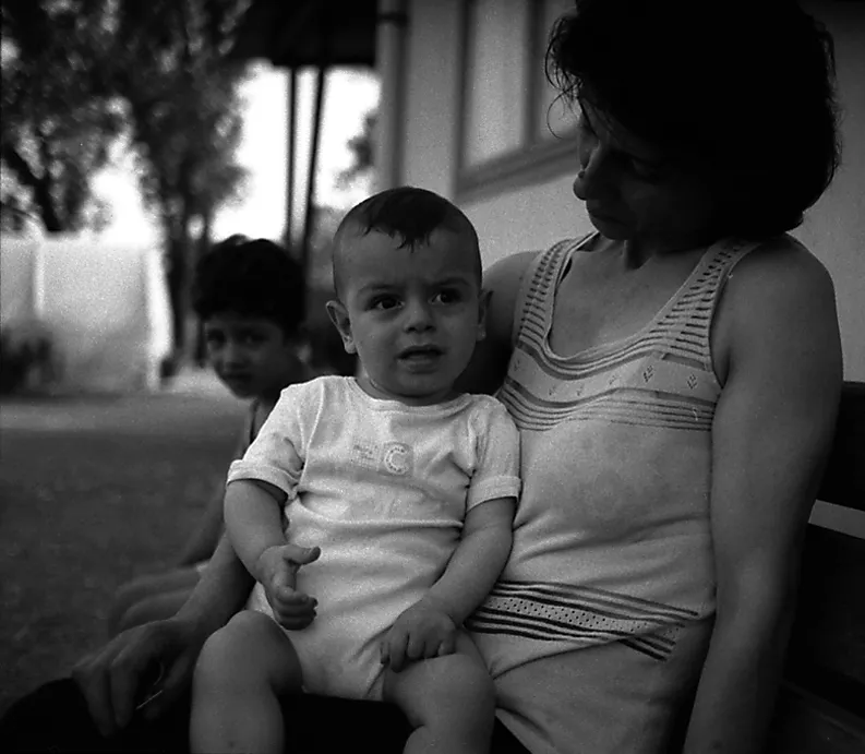 mother with baby on her laps