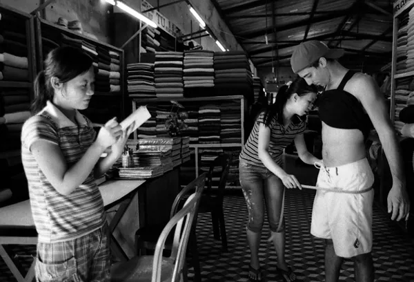 working girl takes measures of american tourist