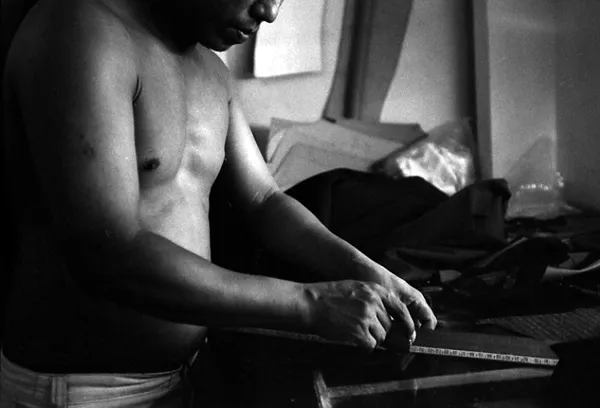 worker cuts the textile